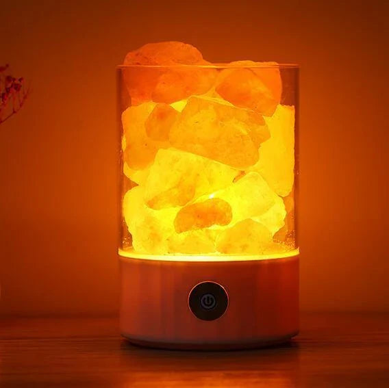 Himalayan salt lamp with warm, amber glow and adjustable lighting settings
