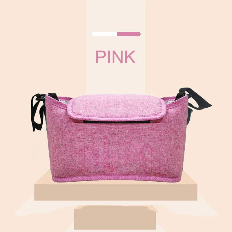 Stylish baby pram organiser bag made of premium cotton and linen materials, featuring various compartments and colour options to keep your child's essentials organised.