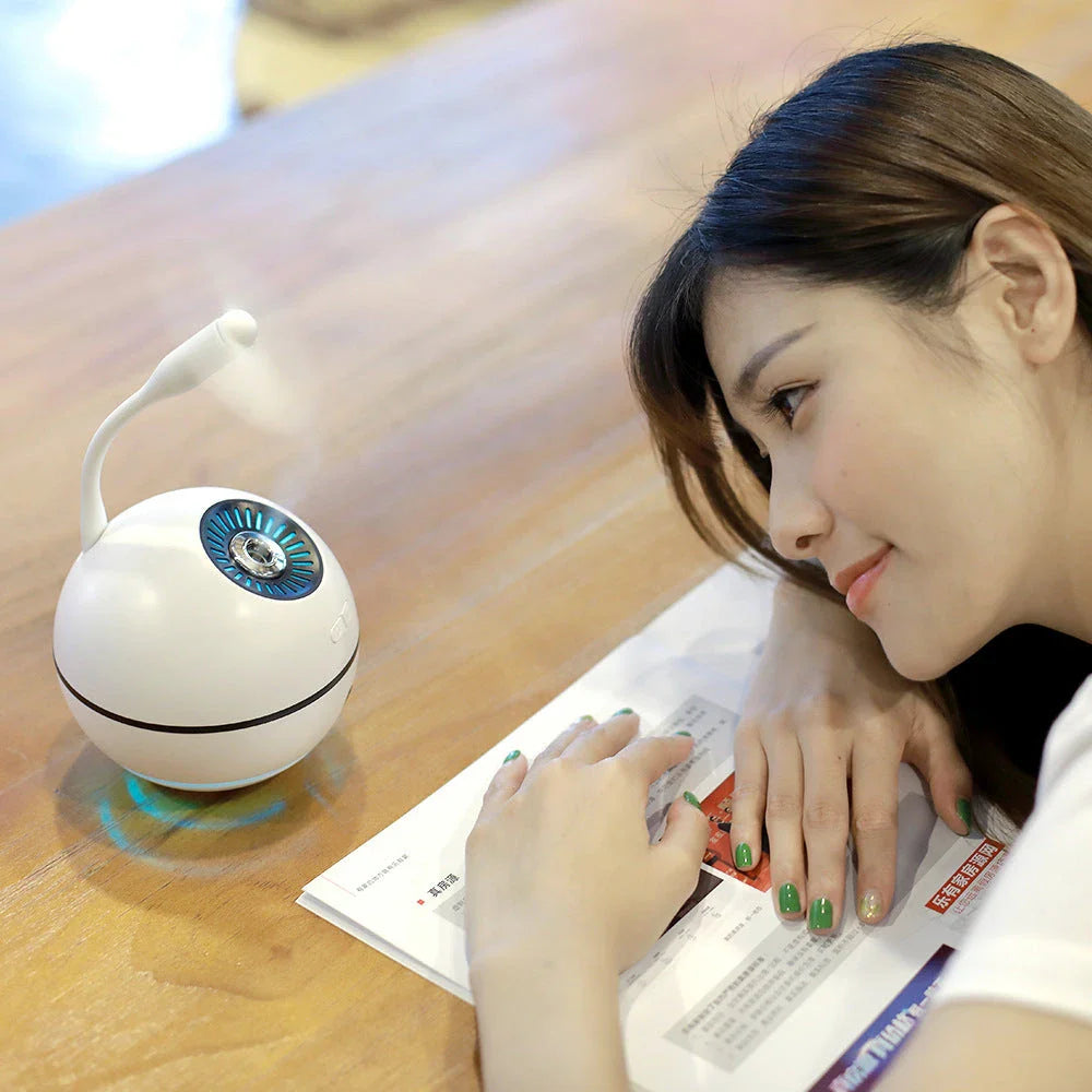 Cordless humidifier with rechargeable battery, LED lighting, and compact design for home or office use
