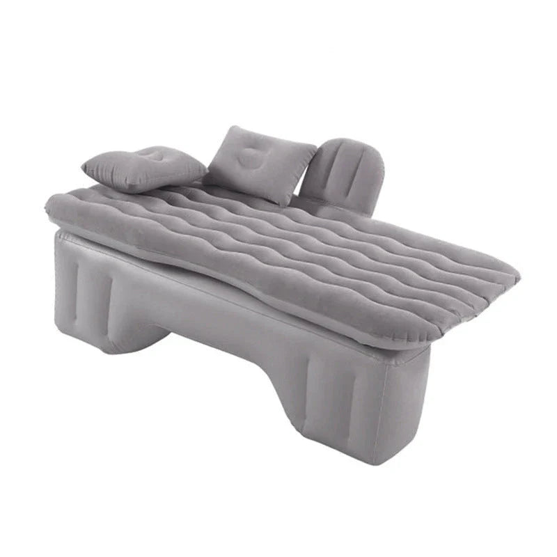 Inflatable car mattress with pillows in various colors, perfect for comfortable road trips and outdoor adventures