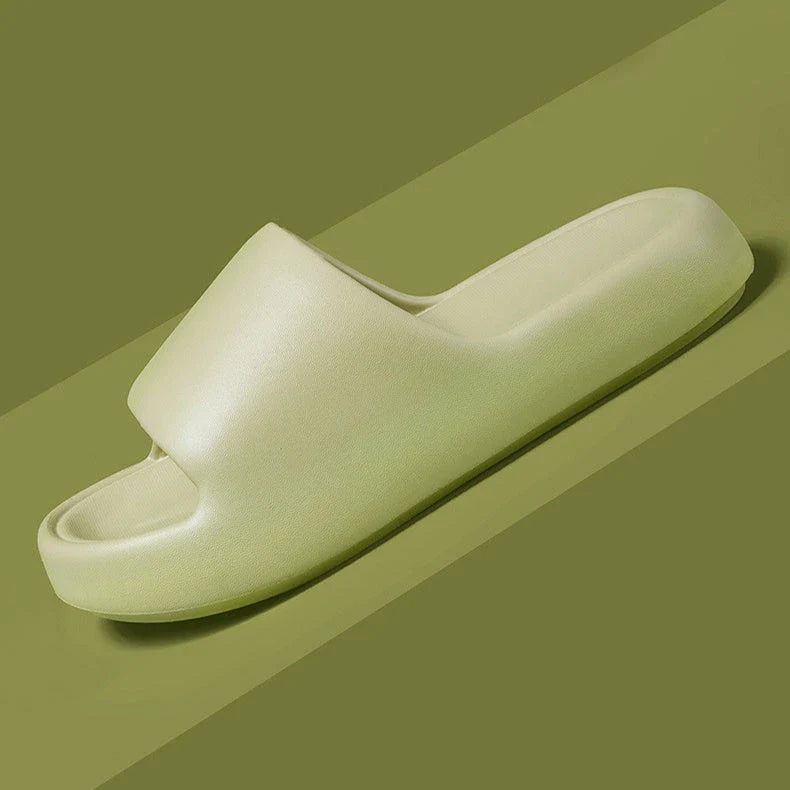 Comfortable EVA foam slip-on slippers in various colors, featuring non-slip soles and a breathable design for indoor and bathroom use.