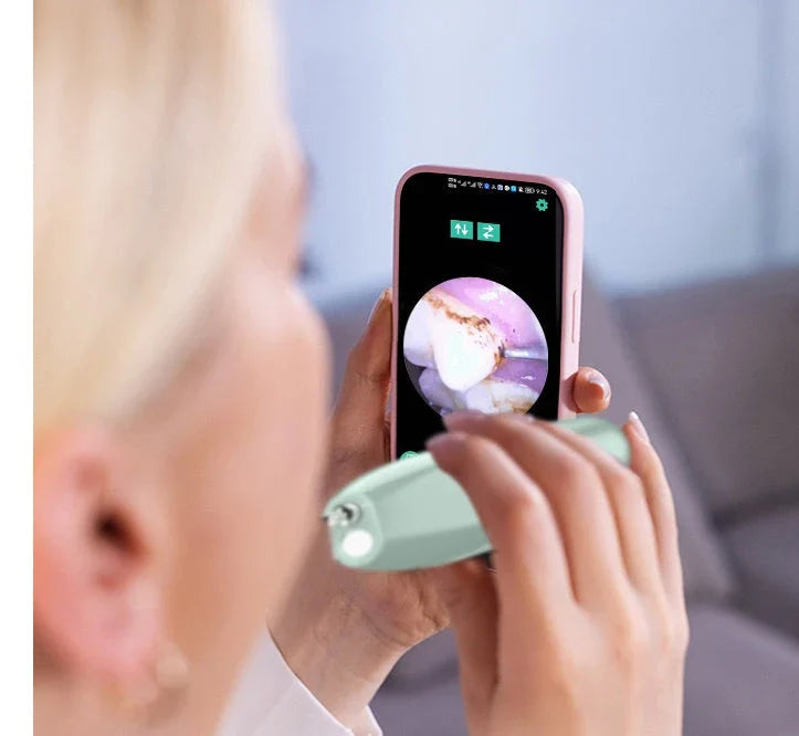 Close-up view of the high-powered dental cleaning tool with visual assistance and stainless steel construction