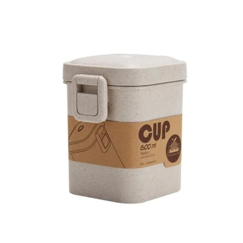 A stylish microwave-safe lunch box with a removable soup mug in various colours, including pink, green, and apricot