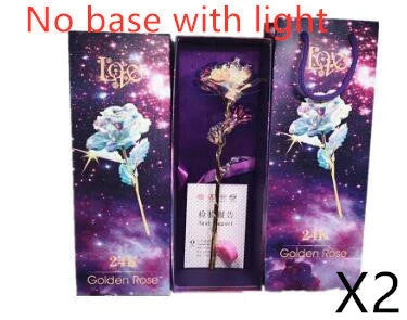 A luxurious 24K gold-plated rose flower bouquet set with a gift box and tote bag