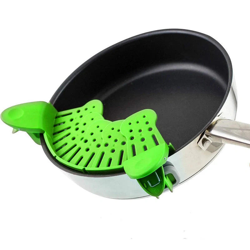 Universal Silicone Clip-on Pan Pot Strainer in purple and green, showcasing its compact design and clip mechanism