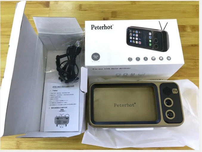 Vintage-inspired portable Bluetooth speaker with retro TV-style design and sleek, compact body