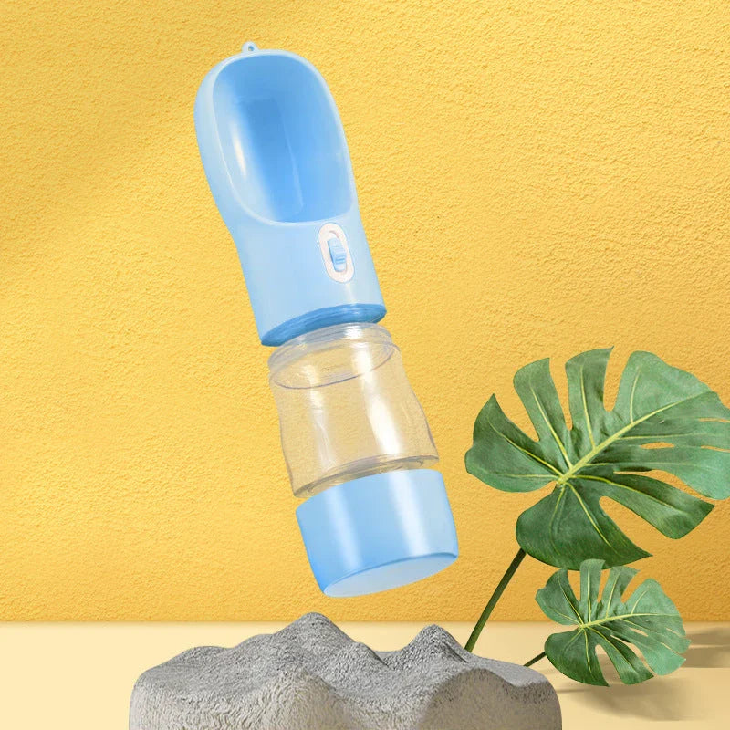 Portable pet water bottle and food bowl made of durable plastic, available in multiple colors for outdoor adventures with your furry friend.