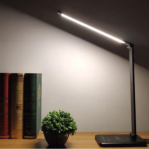 Premium wireless charging LED desk lamp with adjustable lighting, auto-timer, and foldable design for a customisable workspace