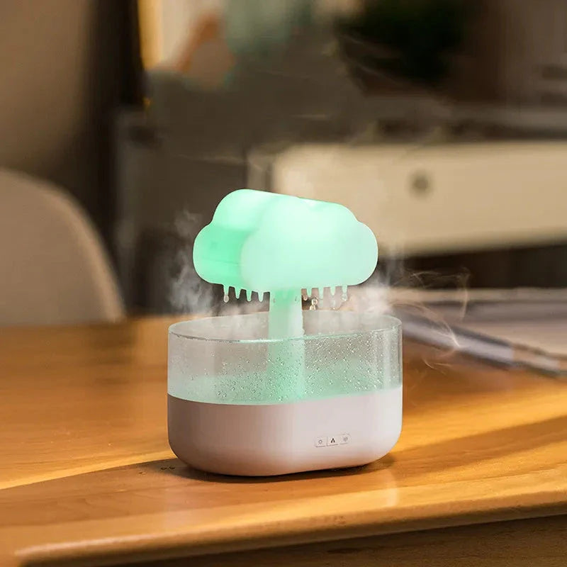 Stylish rain cloud-inspired humidifier with color-changing LED lights and essential oil diffuser for a relaxing and aromatic experience