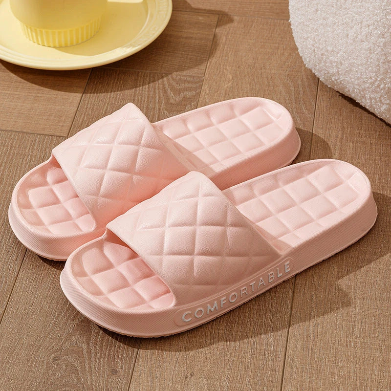 Cozy plaid indoor slippers with soft, silent, and waterproof EVA construction for comfortable all-day wear