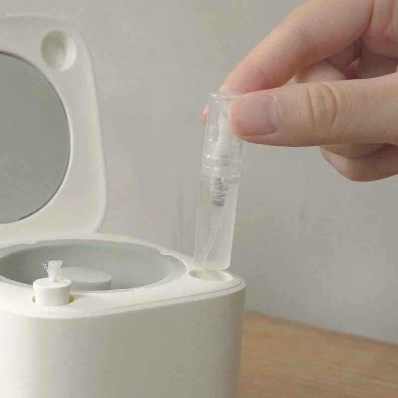 Automatic earbuds cleaning kit for AirPods, featuring a specialized chamber and cleaning mechanisms to thoroughly remove dirt and wax buildup