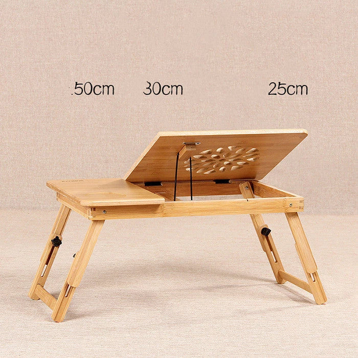Ergonomic bamboo laptop desk with storage drawers, adjustable legs, and cooling fan for comfortable home office use