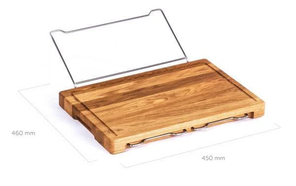 Bamboo cutting board with plastic storage trays for organizing and containing chopped food items