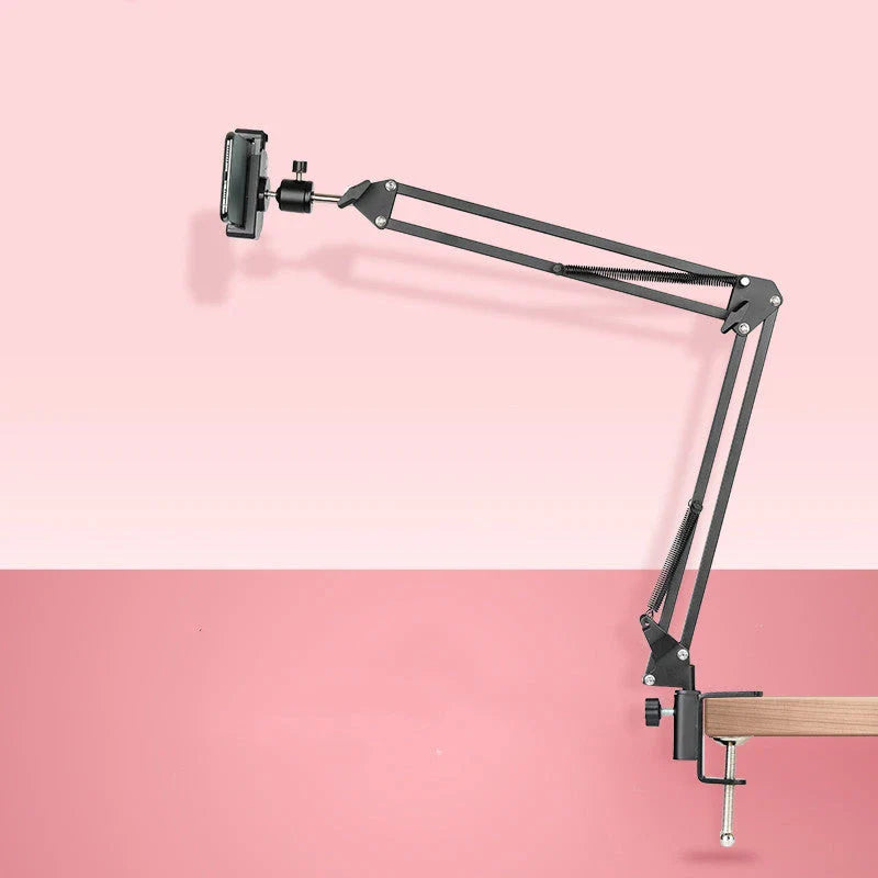 Versatile desktop phone and tablet holder with adjustable arm and 360-degree rotation for easy device positioning