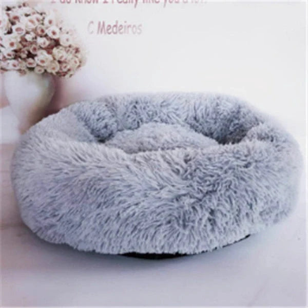 Cosy round plush cat mattress for winter warmth, available in various colours and sizes