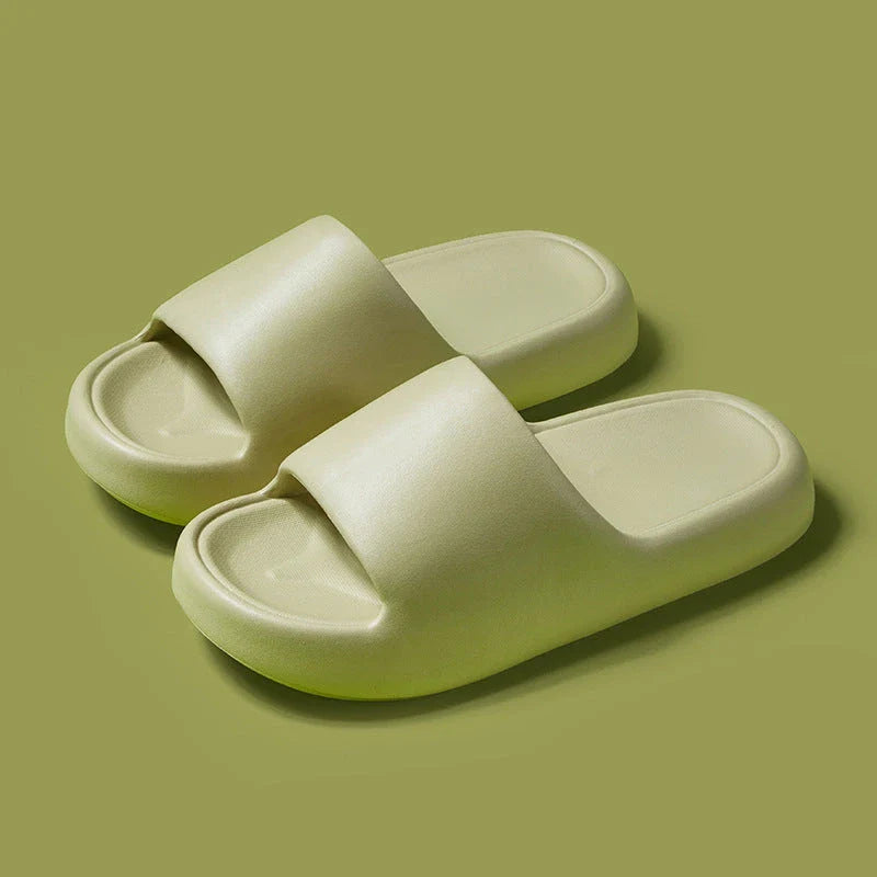Comfortable EVA foam slip-on slippers in various colors, featuring non-slip soles and a breathable design for indoor and bathroom use.