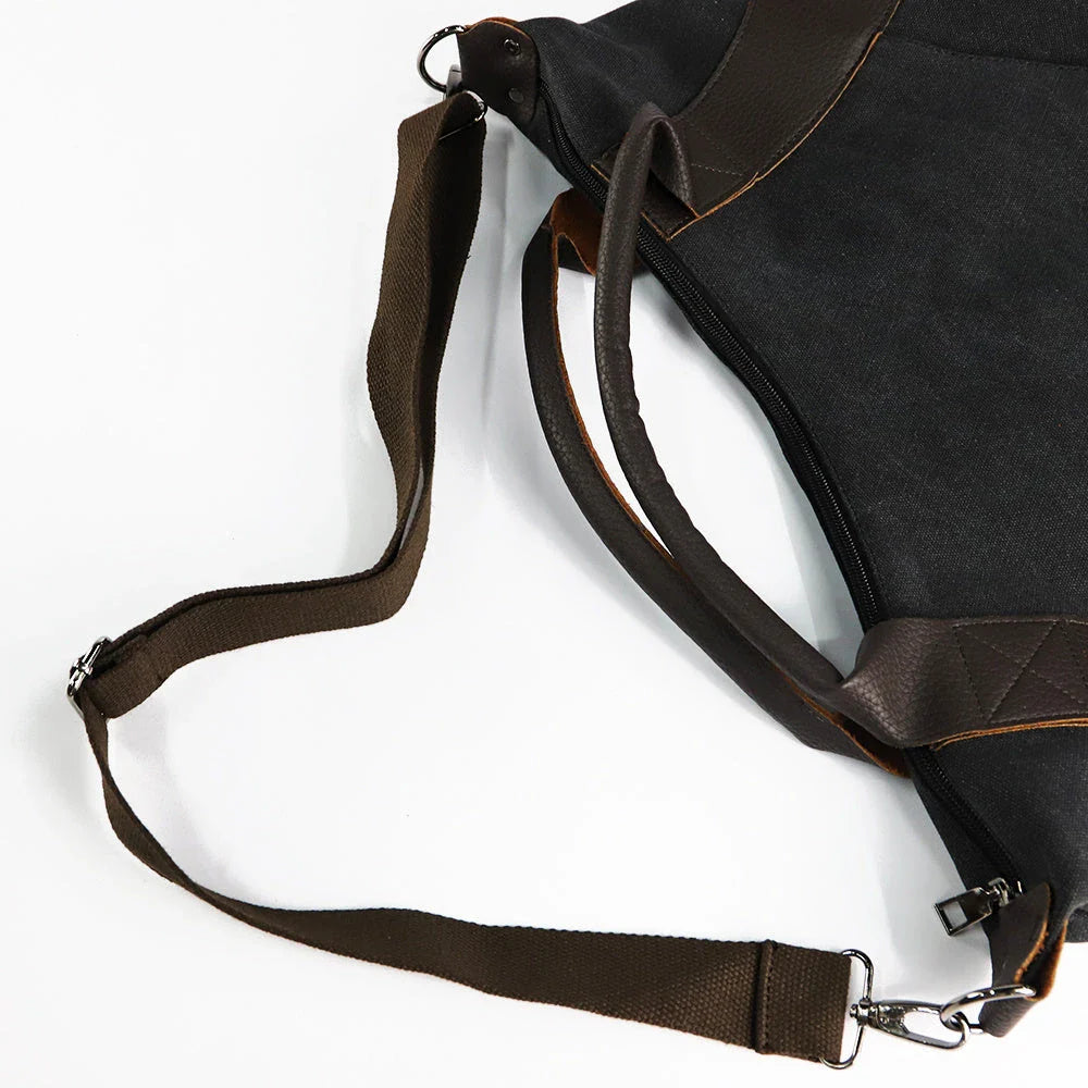 Stylish and versatile canvas shoulder bag with premium brass hardware and thoughtful interior organisation