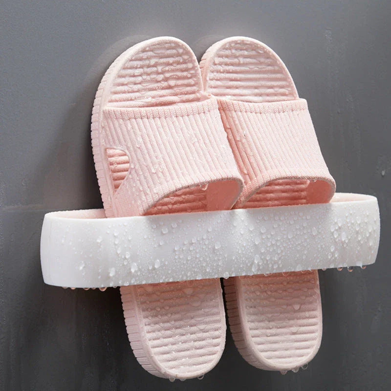 Premium bathroom slippers with suction cups for secure hold, available in pink, blue, and grey colours