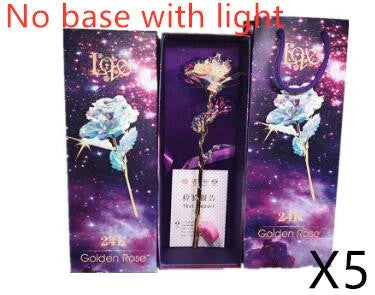 A luxurious 24K gold-plated rose flower bouquet set with a gift box and tote bag