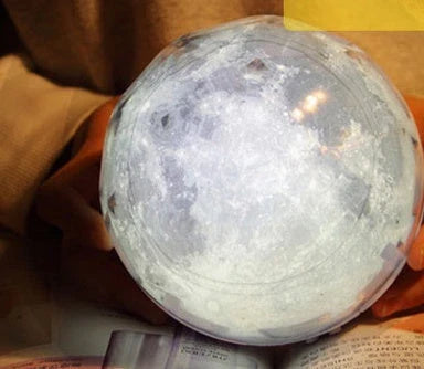 Galaxy Projector Lamp with different lighting themes and settings, including stars, planets, and constellations
