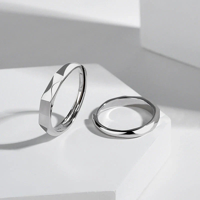 Stylish sterling silver rings with a hidden love pattern design, perfect for romantic gifts or personal accessorizing.