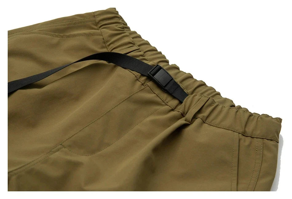 Japanese-inspired retro cargo shorts in khaki and black colours, featuring a loose, straight-leg fit and generous pockets for versatile style and comfort.