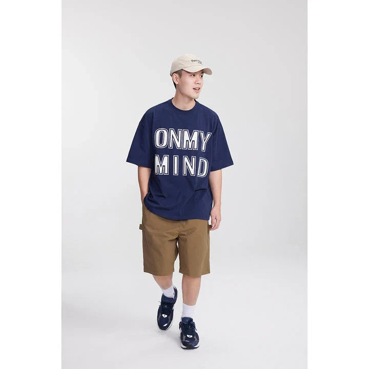 Japanese-inspired retro cargo shorts in khaki and black colours, featuring a loose, straight-leg fit and generous pockets for versatile style and comfort.