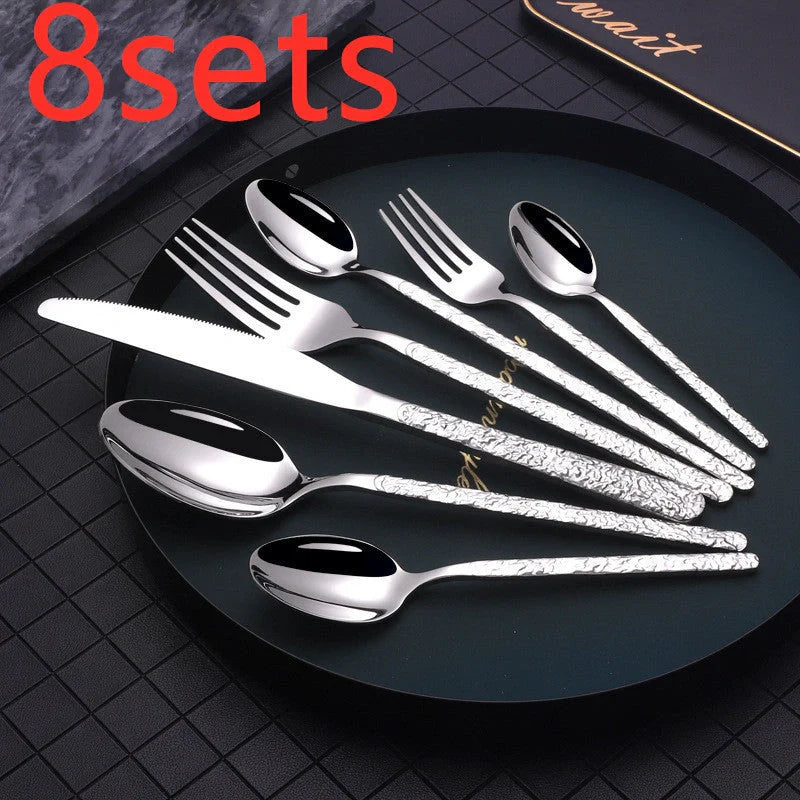 Premium steak cutlery set with embossed textured handles, made of durable stainless steel for a refined dining experience.
