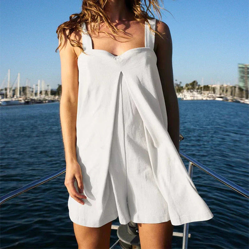 Sleeveless jumpsuit in various colors featuring a square neckline and relaxed fit for comfortable summer style