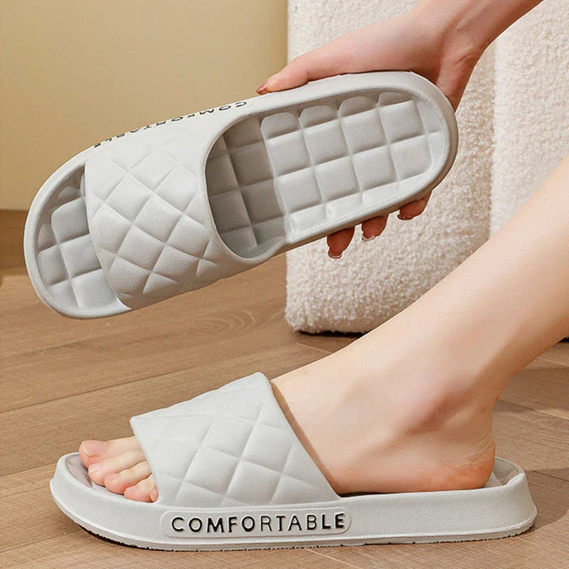 Cozy plaid indoor slippers with soft, silent, and waterproof EVA construction for comfortable all-day wear