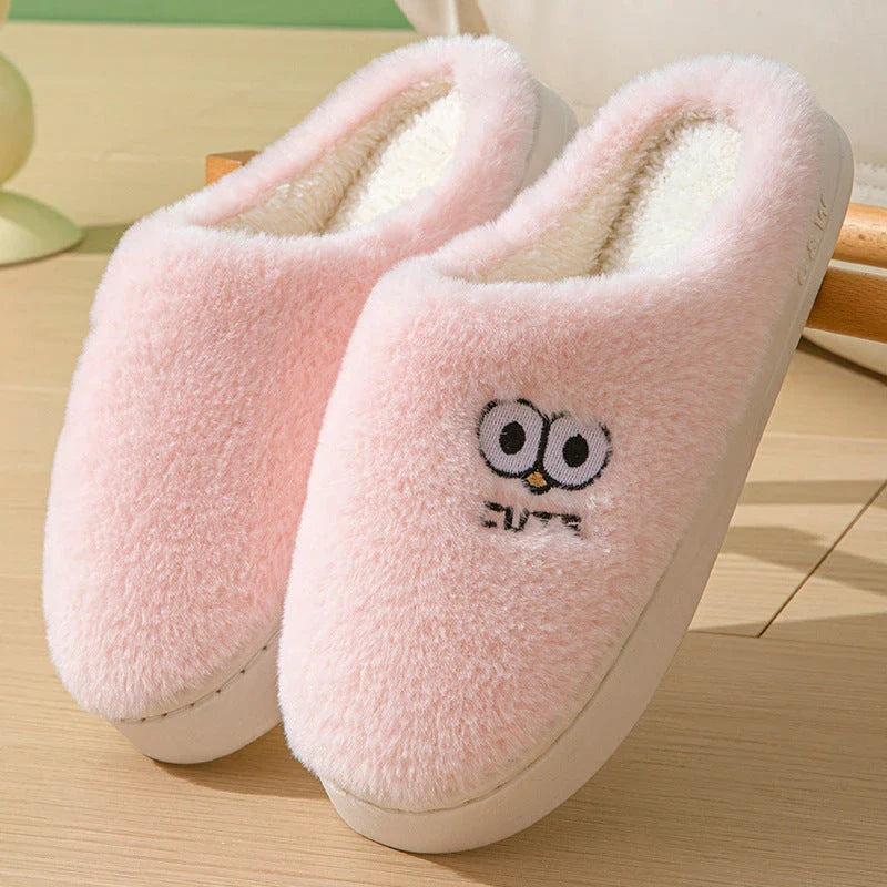 Cozy cartoon-themed slippers for couples, featuring plush material and non-slip rubber soles in a variety of vibrant colors.