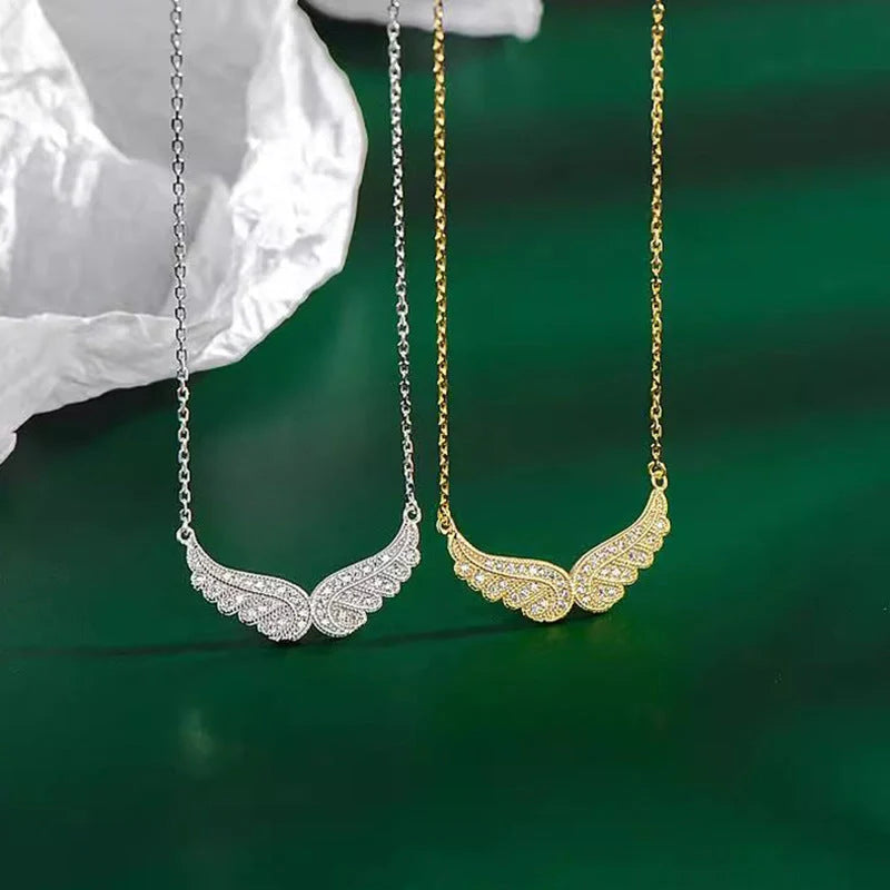Stunning sterling silver angel wings pendant necklace with cubic zirconia stones