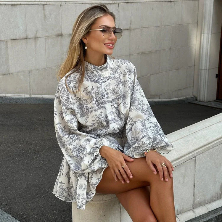 Stylish ink print A-line dress with fashionable puffy sleeves and lapel tie detail