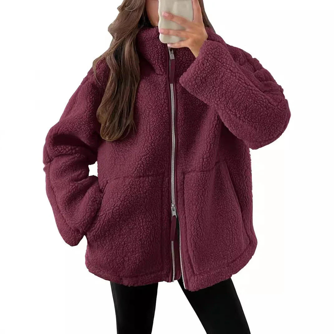 Classic padded fleece jacket in various colours for women, featuring a zip-up design and pockets