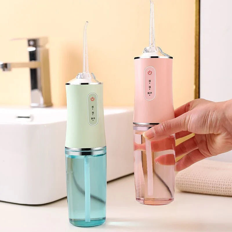 Rechargeable dental water flosser with multiple colour options and USB charging capability