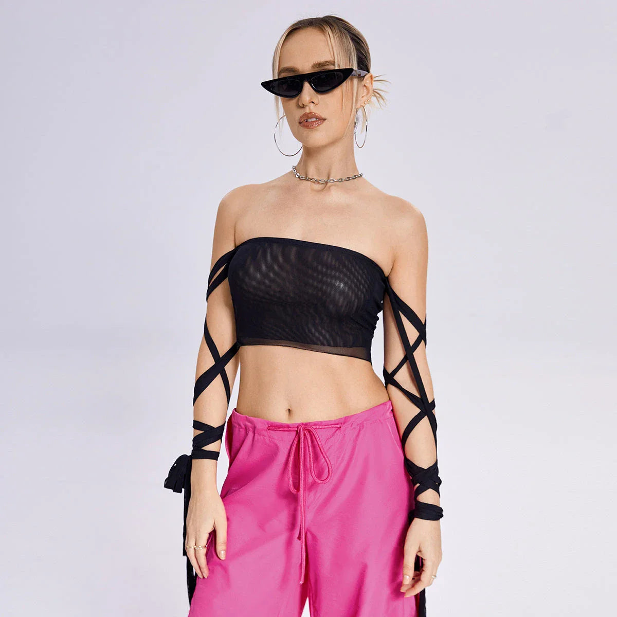 Stylish women's tank top with elastic cross-arm straps, available in black color