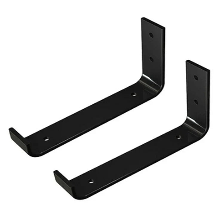 Sturdy black iron wall shelves in three sizes for displaying books, decor, and more in a rustic home setting