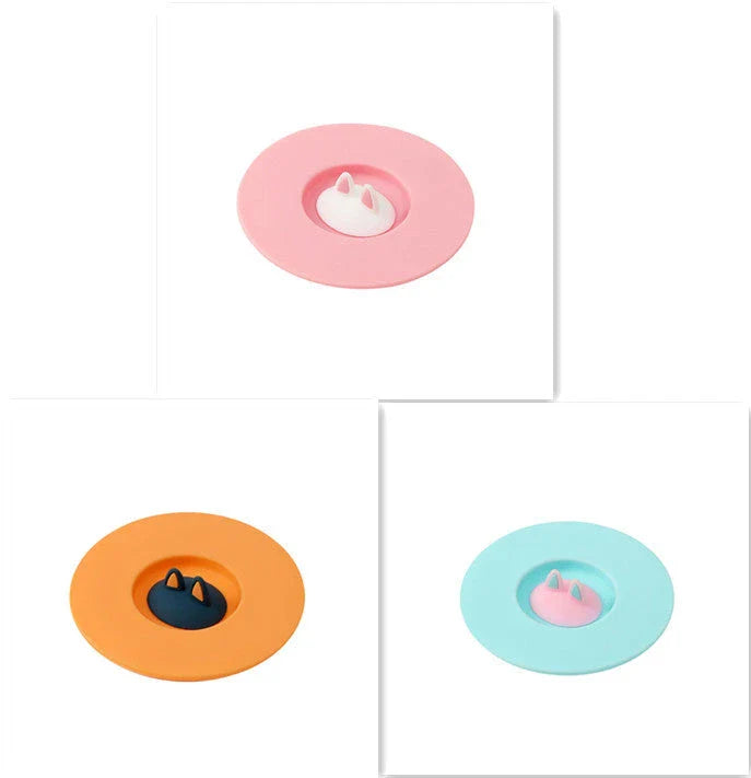 Spill-Proof Cat Ear Silicone Drink Lid in various colors, including pink, orange, and blue