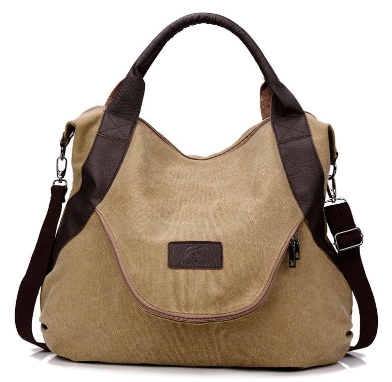 Stylish and versatile canvas shoulder bag with premium brass hardware and thoughtful interior organisation