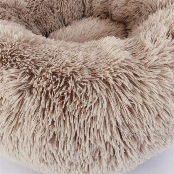 Cosy round plush cat mattress for winter warmth, available in various colours and sizes