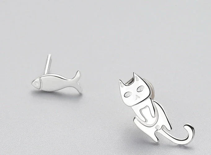 Elegant asymmetric 925 sterling silver stud earrings with cat and fish motifs, a modern and sophisticated accessory