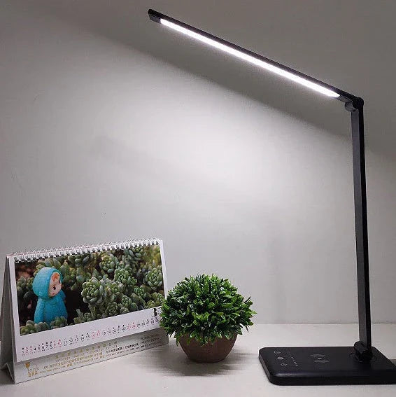 Premium wireless charging LED desk lamp with adjustable lighting, auto-timer, and foldable design for a customisable workspace