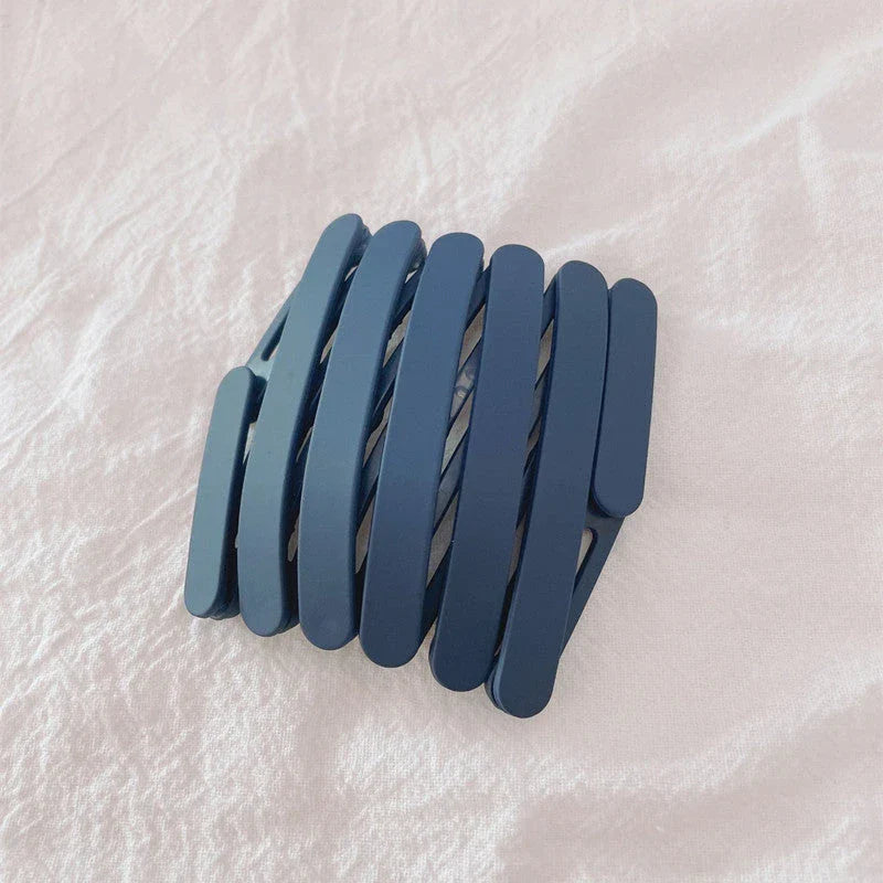 Retractable Pocket Hair Band - A stylish, secure, and convenient hair accessory that can be easily stored in your pocket or bag.