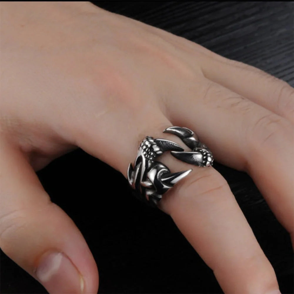 Striking open dragon claw ring made from premium titanium steel, with a lustrous chrome-like finish and adjustable, comfortable fit