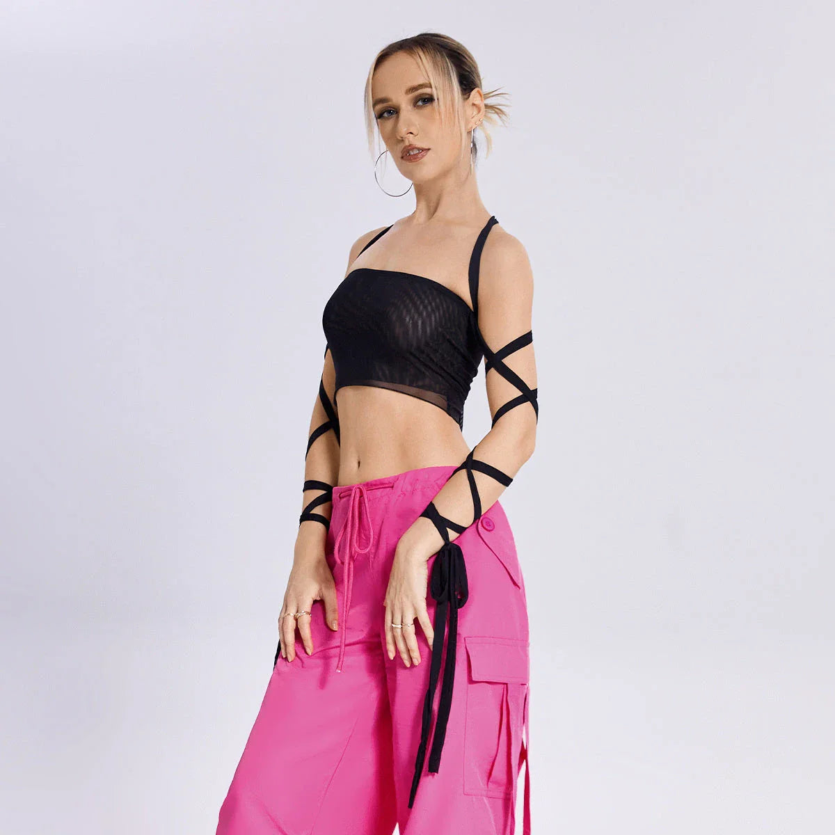 Stylish women's tank top with elastic cross-arm straps, available in black color