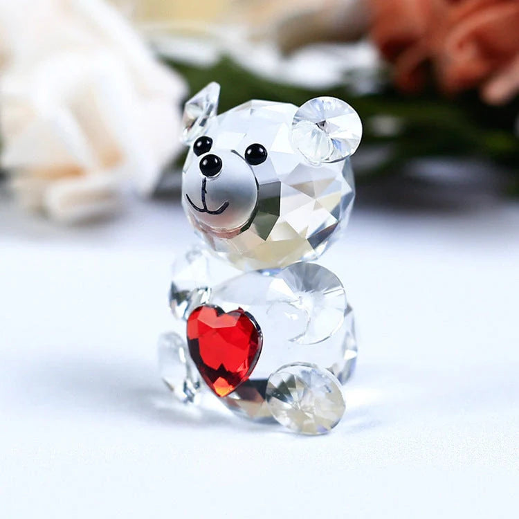 Hand-carved white crystal bear figurine with geometric design