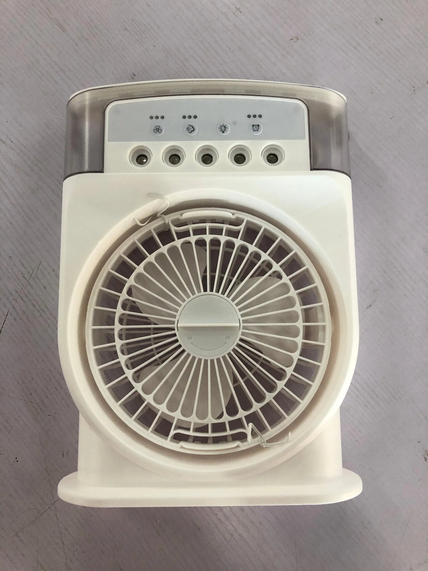 Compact USB-powered evaporative air cooler with 7-color mood lighting, portable design, and powerful fan for personal climate control