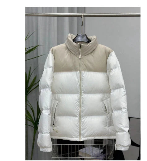 A stylish padded winter coat with contrast-coloured accents, designed for both men and women to stay warm and look fashionable.