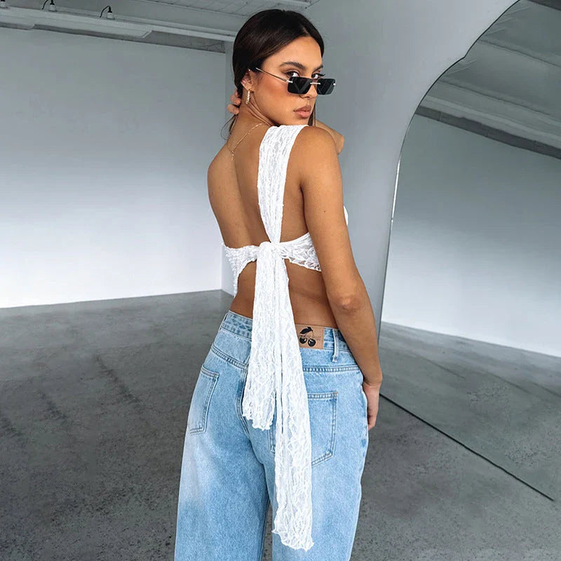 Chic backless lace top in various colors, featuring a unique design, slim fit, and breathable polyester fabric for effortless summer style.