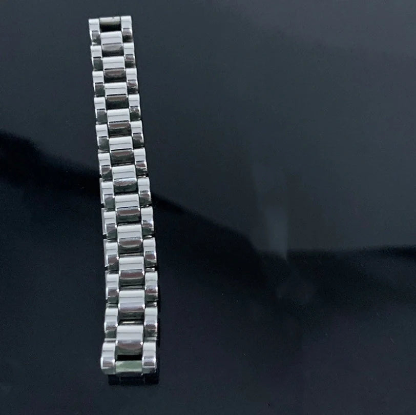 Stylish titanium steel bracelet watch for women with geometric design and adjustable length.